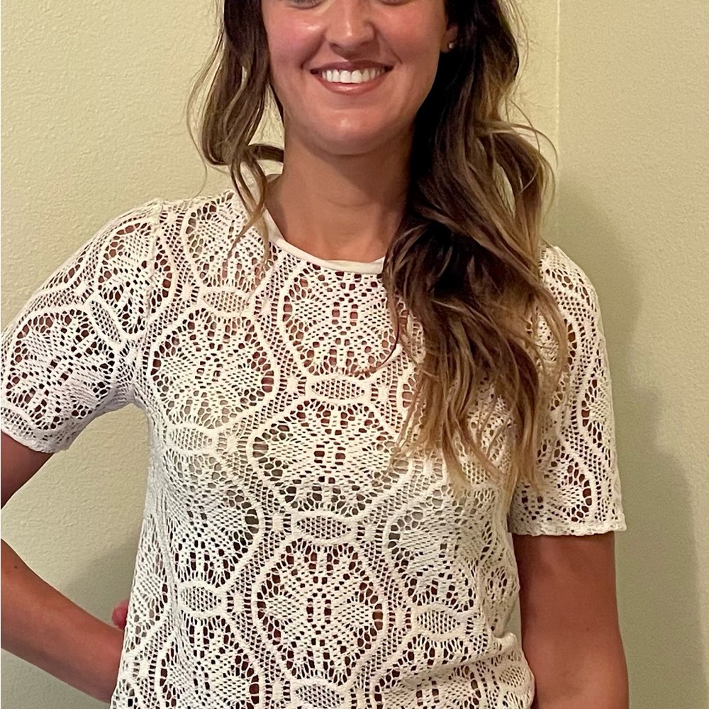 Banana Republic XS lace tee. My daughter is a sz 8 and is modeling this.
